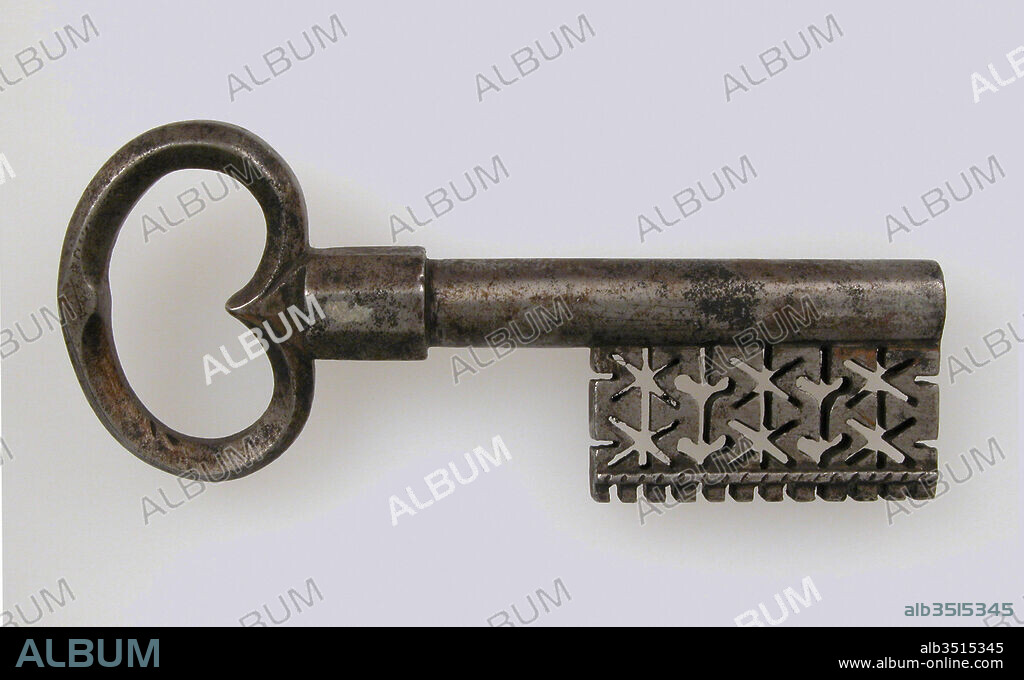 Key, 15th century, German, Iron, Overall: 4 1/4 x 1 15/16 x 9/16 in. (10.8 x 4.9 x 1.4 cm), Metalwork-Iron, The decoration of Gothic iron locks and keys was often elaborate and of the highest standard of workmanship. The motifs were frequently drawn from Gothic architecture, reproducing on a miniature scale complicated tracery patterns and even tiny statuettes.