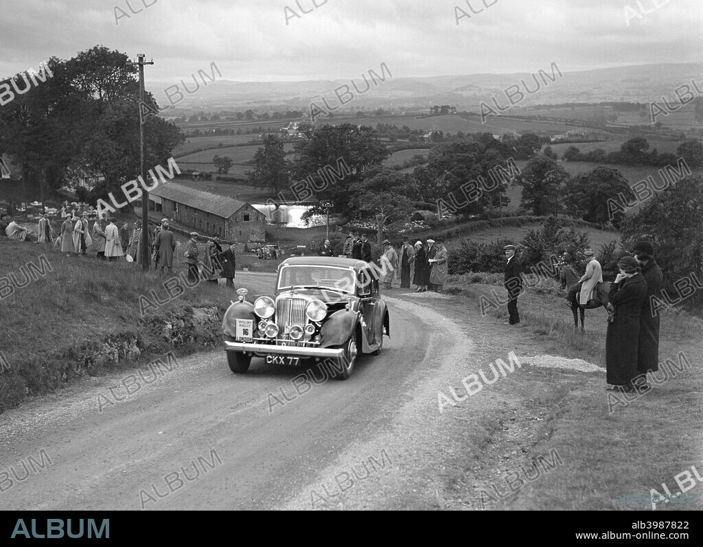 SS Jaguar   Saloon 1936 2663 cc. Vehicle Reg. No.  CKX77.  Event Entry No: 16. Driver: Hand, D.S. Place: S.W.A.C. Welsh Rally. Date: 30.6-3.7.37.