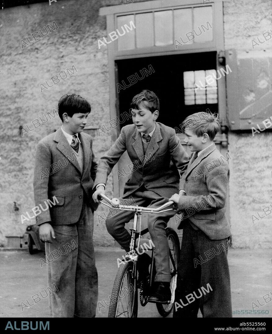 The Glucesters at Home At Barnwell Manro - Royal Cousins: Prince Michael of Kent (left who is visiting Barnwell Manor, with Prince William (on the bicycle) and Prince Richard. March 2, 1955. (Photo by Tom Blau, Camera Press).
