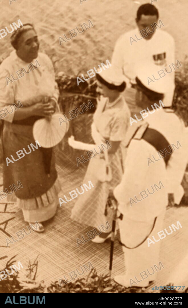 Photograph of Queen Salote Tupou III (1900-1965)with Queen Elizabeth II (1926-). Dated 20th Century.