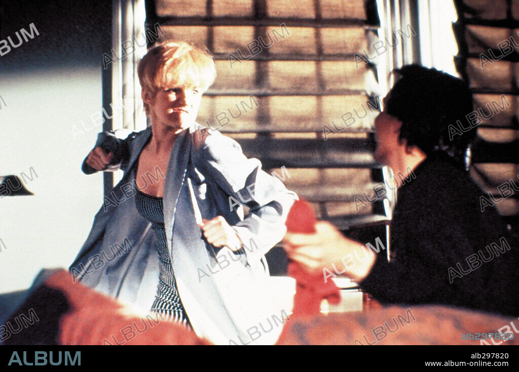ELLEN BARKIN and JIMMY SMITS in SWITCH, 1991, directed by BLAKE EDWARDS. Copyright CINEMA PLUS.