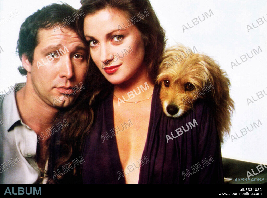 CHEVY CHASE and JANE SEYMOUR in OH HEAVENLY DOG, 1980, directed by JOE CAMP. Copyright 20TH CENTURY FOX.