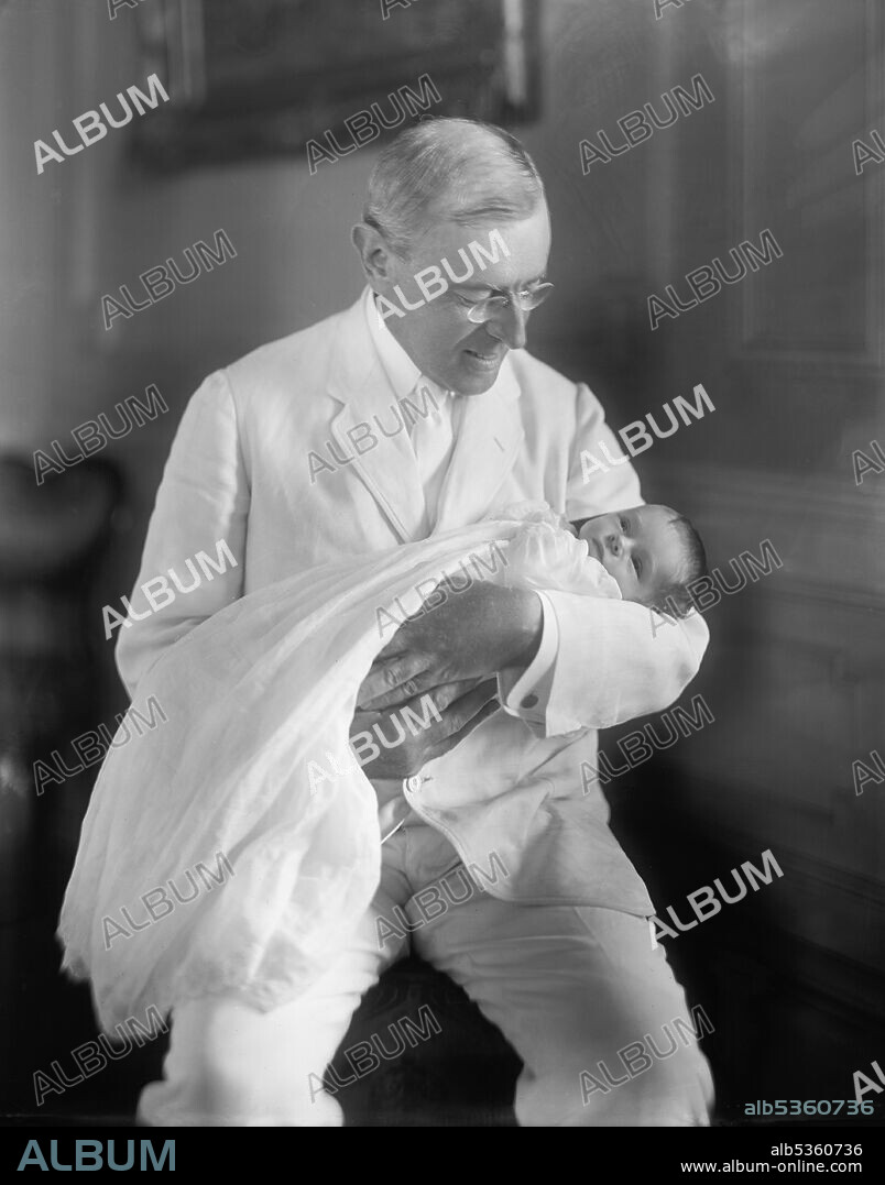 U.S. President Woodrow Wilson Holding Granddaughter, Ellen Wilson McAdoo, Portrait, circa 1915.