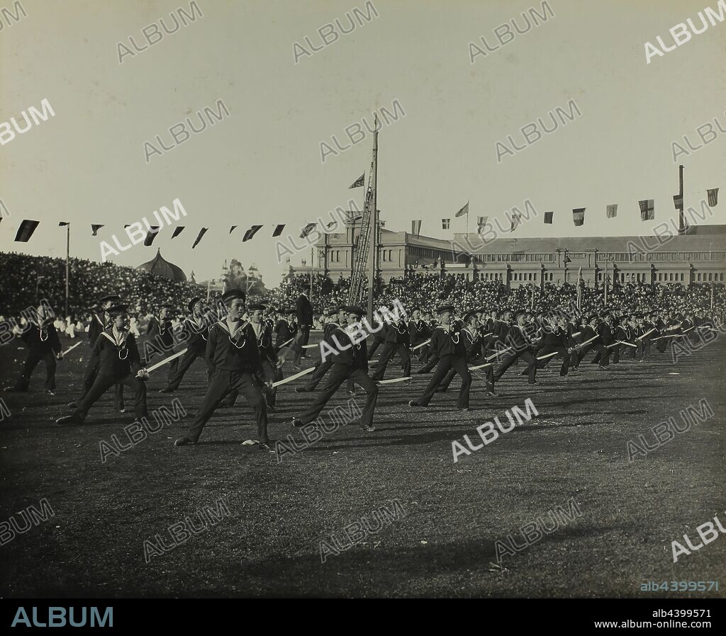 Photograph - 'State School Fete, Exhibition Building, Cutlass Drill', Melbourne, 11 May 1901, One of a set of 47 original photographs of the Australian Federation celebrations in Melbourne 1901 to mark the opening of the first Federal Parliament of Australia. The photographs trace the Royal Visit of the Duke and Duchess of Cornwall and York for the occasion, from their arrival in Melbourne on the Royal Yacht 'Ophir' at St Kilda Pier on 6 May 1901 to their departure for Brisbane at Port.
