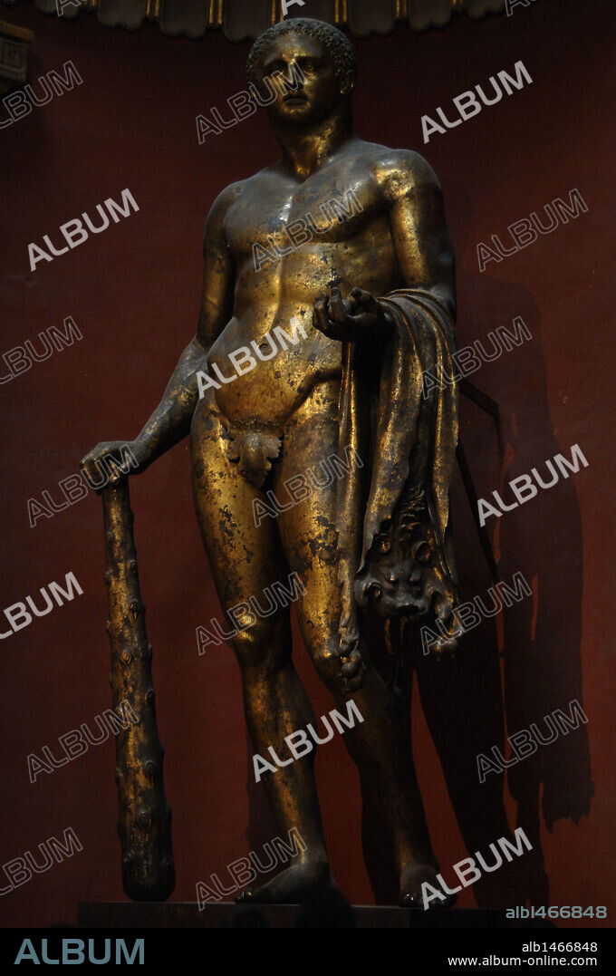 Hercules with mallet, skin of the Nemean lion and golden apples. Colossal gilded bronze statue. Sculpted probably between 1st and 2nd centuries A.D. Found near Campo dei Fiori in 1864. Pio-Clementino Museum. Vatican Museums.
