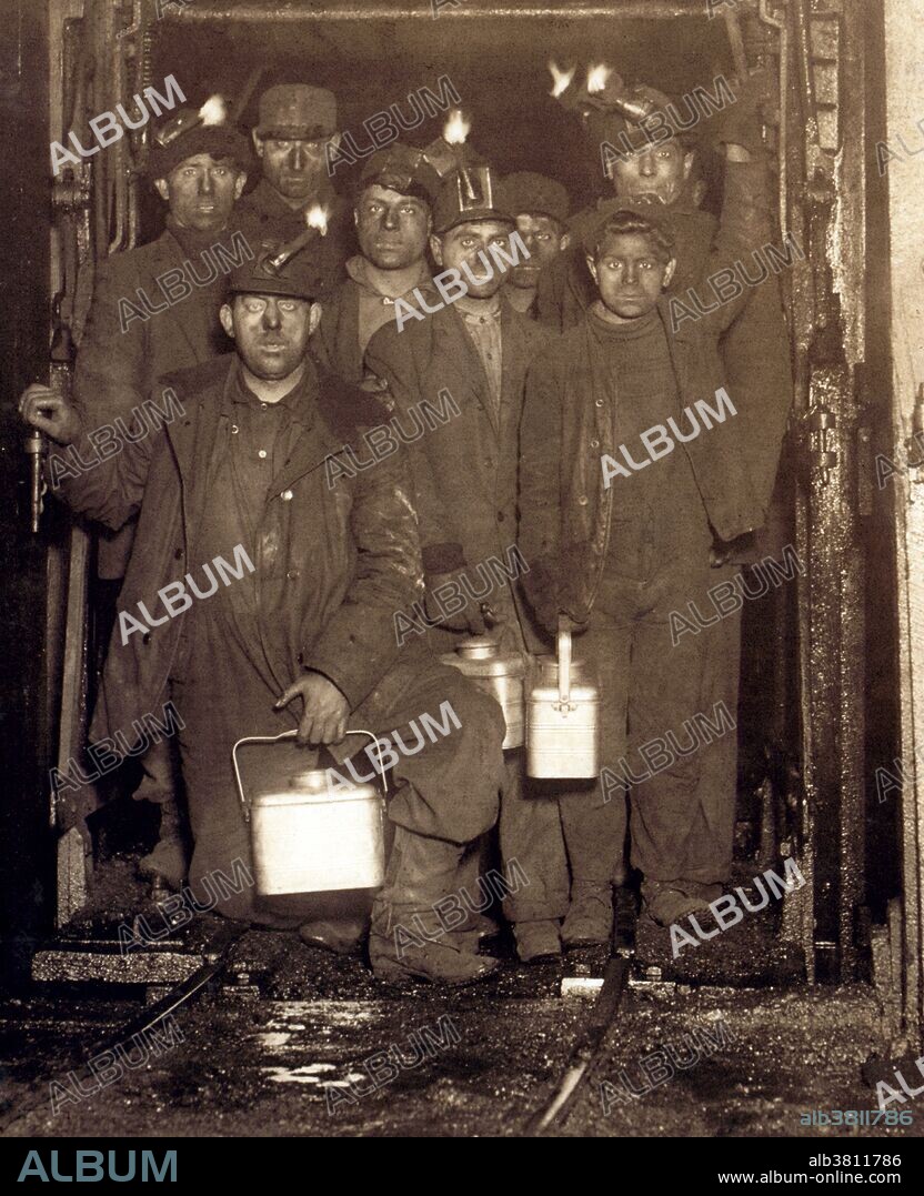 Entitled: "At the close of the day. Waiting for the cage to go up. The cage is entirely open on two sides and not very well protected on other two, and is usually crowded like this. Small boy in front is Jo Pume, a Nipper, 163 Pine Street. Shaft #6, Pennsylvania Coal Company. Location: South Pittston, Pennsylvania." Child labor refers to the employment of children in any work that deprives children of their childhood, interferes with their ability to attend regular school, and that is mentally, physically, socially or morally dangerous and harmful. According to the 1900 US Census about 1 in every 6 Children between the ages of five and ten were engaged in "gainful occupations" in the United States. This trend alarmed Americans who, while supporting the traditional role of children in agriculture, found the idea of American youth laboring for meager wages in industrial factories appalling. From 1909 to 1921 the NCLC (National Child Labor Committee) capitalized on this moral outrage by making it the focal point of the NCLC campaign against child labor. They hired Lewis Hine, a teacher and professional photographer trained in sociology, to document child labor in American industry. Over the next ten years Hine would publish thousands of photographs designed to pull at the nation's heartstrings. Photographed by Lewis Hine, January 1911.