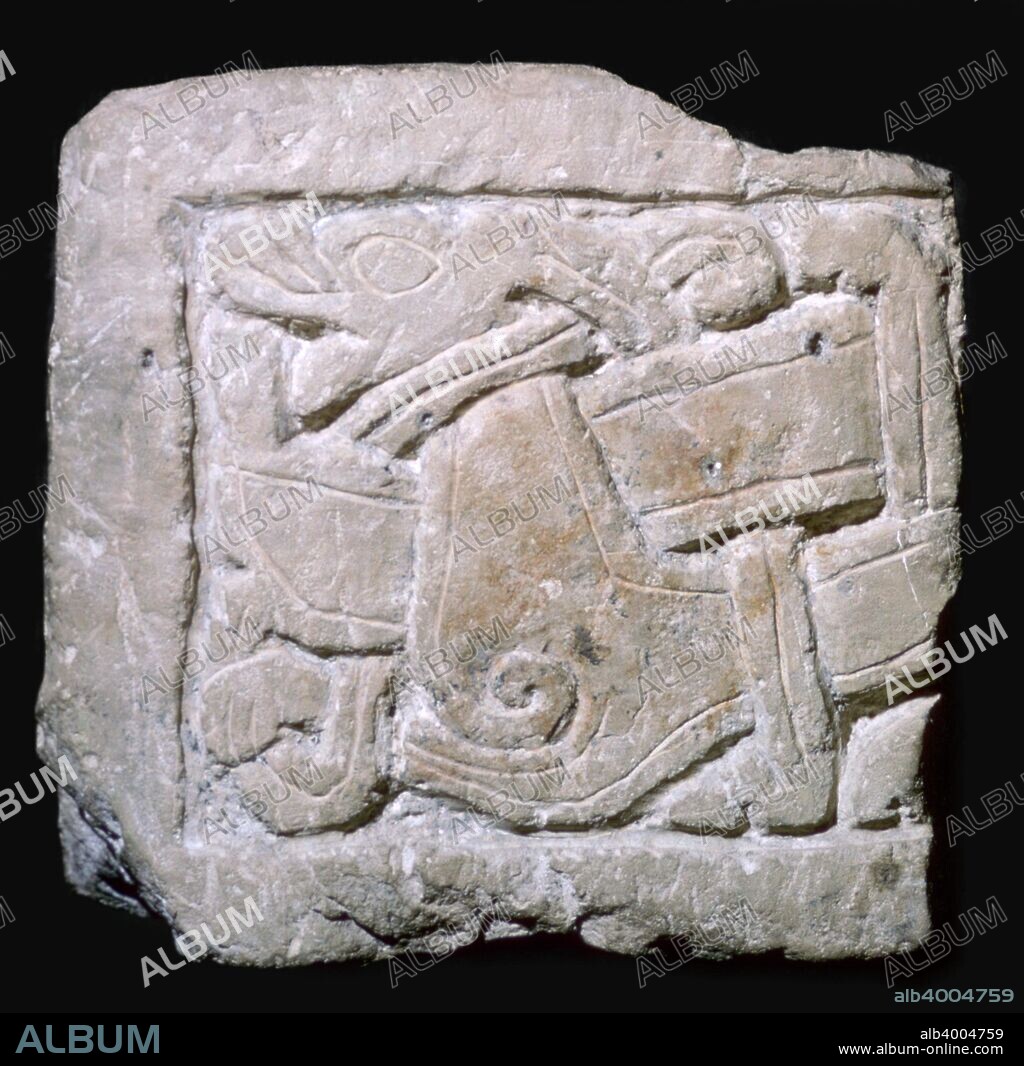 Carved magnesian limestone Viking grave-slab from York made in the Jellinge style.