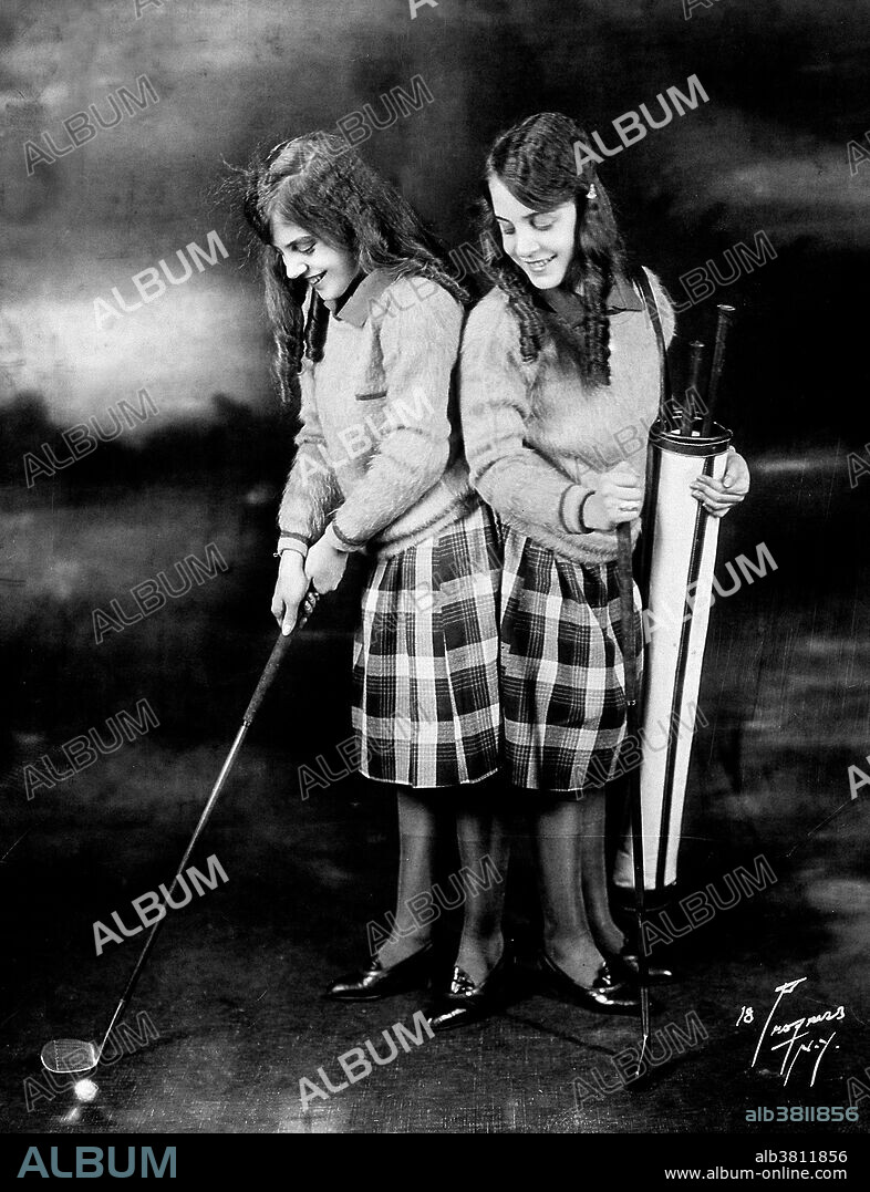 Entitled: "Daisy and Violet Hilton, conjoined twins, dressed for golf. " Daisy and Violet Hilton (February 5, 1908 - January 4. 1969) were a pair of English Siamese Twins, joined by their hips and buttocks; they shared blood circulation and were fused at the pelvis but shared no major organs. Their mother worked in a bar and sold the twins to her boss, who toured them around the world. They gained recognition in Germany, the US and Australia and tap danced in a Bob Hope act. They gained independence in 1931 and went into vaudeville. Violet was a saxophonist and Daisy a violinist. After vaudeville lost popularity, the sisters performed in burlesque, and struggled to make a living. Their last public appearance was in 1961 at a drive-in cinema in Charlotte, North Carolina. Their manager abandoned them there, and with no means of transportation or income, they were forced to take a job in a nearby grocery store. In 1969, after they failed to report to work, their boss called the police. The twins were found dead in their home, victims of the Hong Kong flu. According to a forensic investigation, Daisy died first; Violet died between two and four days later. They were 60 years old. Progress Studio, New York, 1927.