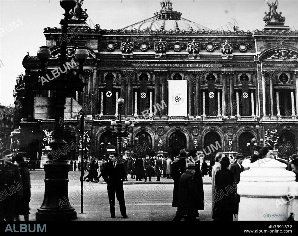 Photograph of Nazi flags hanging from the Paris Opera House, during the German occupation of France, in World War Two. Dated 20th Century.