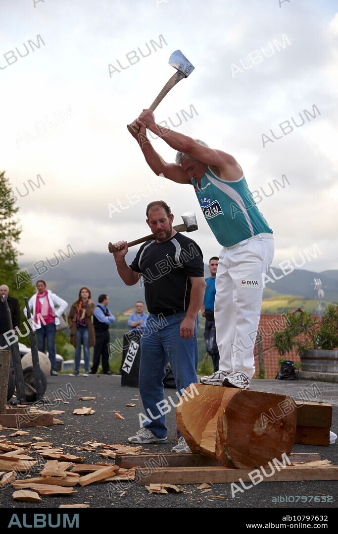 Luis Txapartegi, Aizkolari (wood-chopping), and Iñaki Perurena, Basque rural sport, Aduna, Gipuzkoa, Basque Country, Spain.