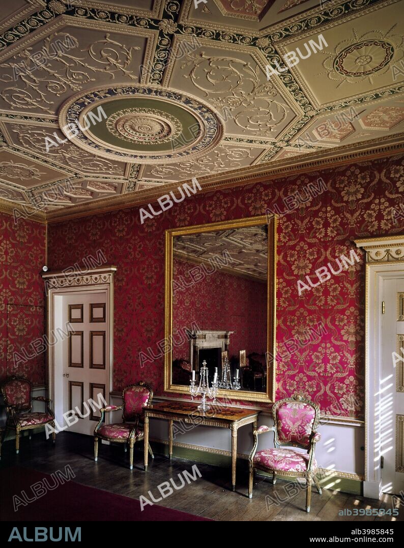 The Great Drawing Room at Audley End House, Saffron Walden, Essex, 1996. The room was designed by Robert Adam and is ornately decorated with mirror, chandelier, pink wallpaper and matching chairs. T.