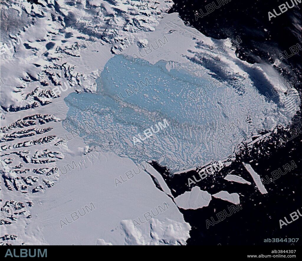 The fifth of five true color images of Antarctica's Larsen B ice shelf collapse during January, February, and March 2002, as recorded by NASA's MODIS satellite sensor. This last image, from March 7, reveals thousands of sliver icebergs and a large light blue area of very finely divided 'bergy bits' where the shelf formerly lay. Brownish streaks within the floating chunks mark areas where rocks and morainal debris are exposed from the former underside and interior of the shelf. The last phases of the retreat totaled approximately 2600 square kilometers.