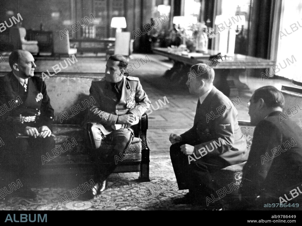 06/27/1940. Berlin. Hitler in his office after the signing of the Berlin-Rome-Tokyo pact. On the left the Count of Ciano and the interpreter Schmidt; on the right the Japanese ambassador Kurusu.