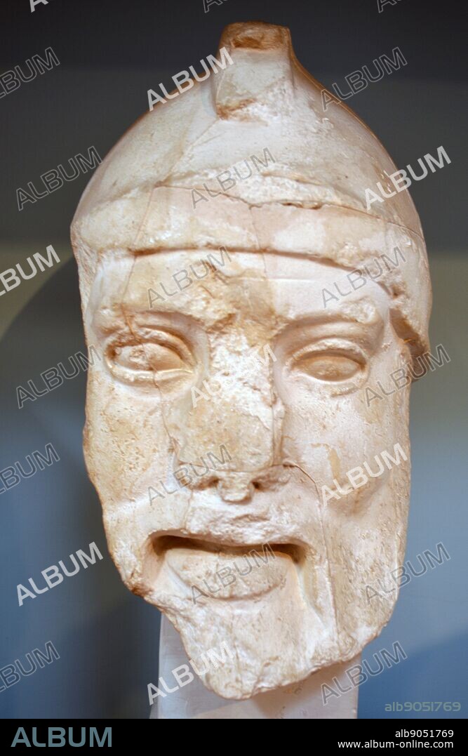 Head of Oinomaos (I) east pediment. In Greek mythology King Oinomaos of Pisa is the father of Hippodamia.