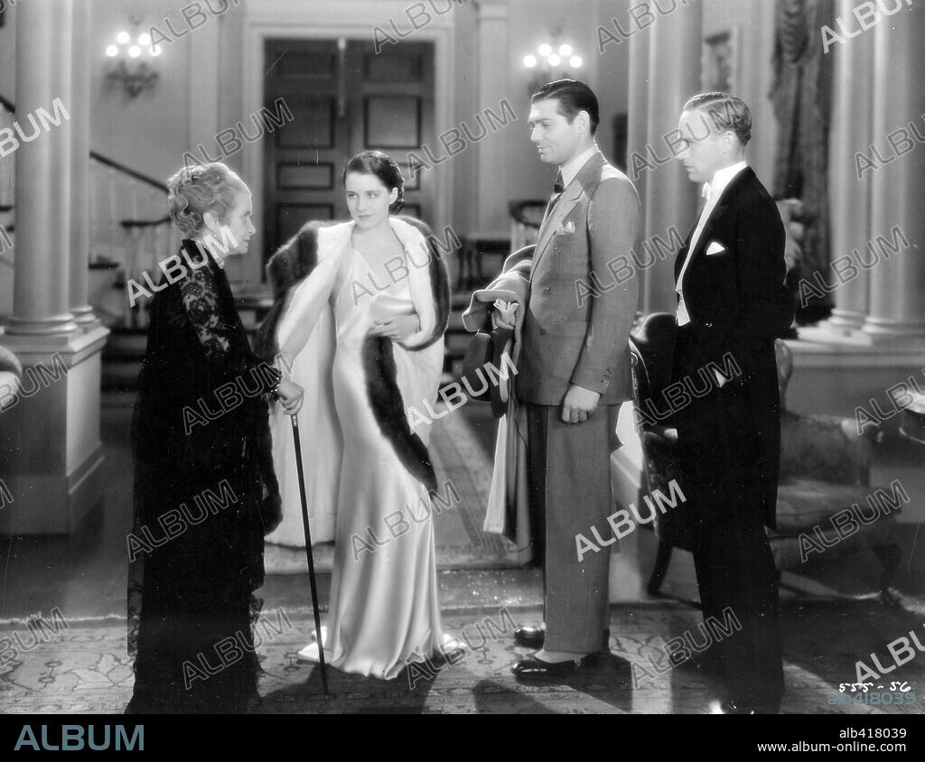 CLARK GABLE, LESLIE HOWARD, LUCY BEAUMONT and NORMA SHEARER in A FREE SOUL, 1931, directed by CLARENCE BROWN. Copyright M.G.M.