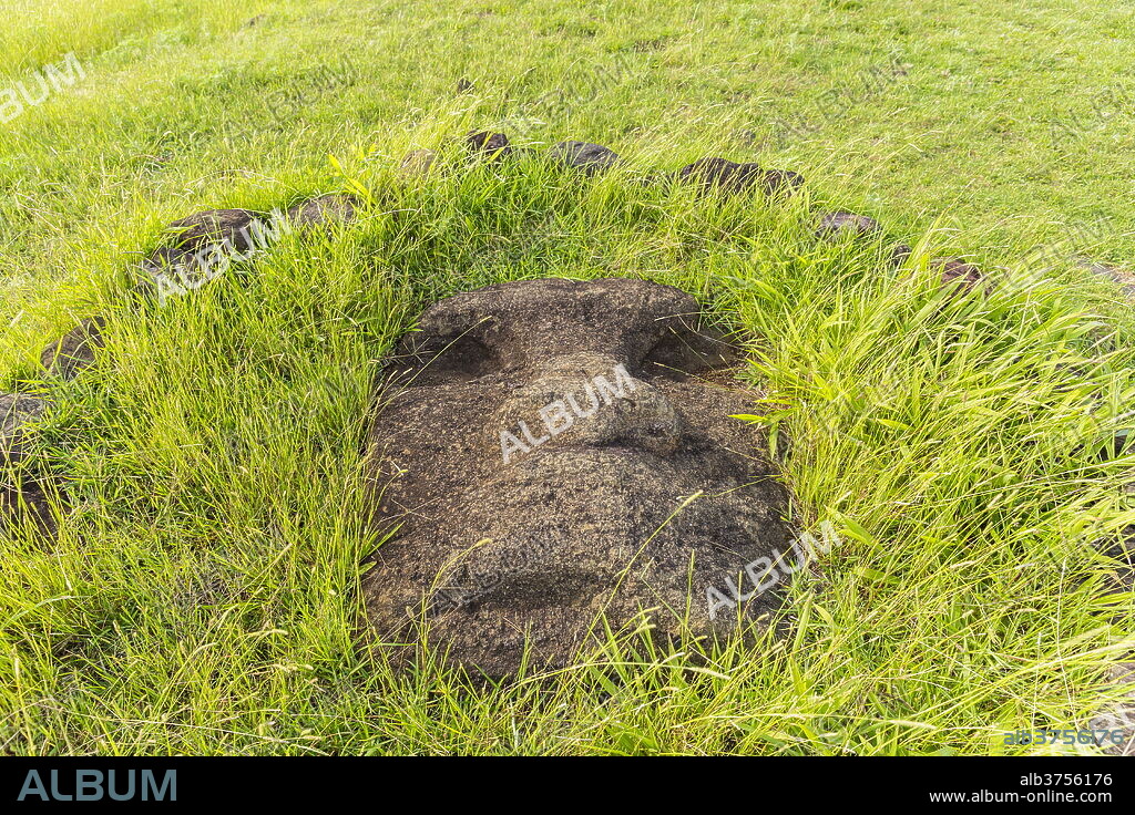 Fallen moai head at the archaeological site at Ahu Vinapu, Rapa Nui National Park, UNESCO World Heritage Site, Easter Island (Isla de Pascua), Chile, South America.