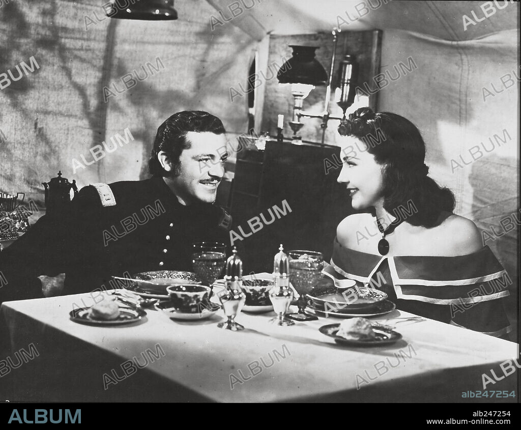 DANA ANDREWS and LYNN BARI in KIT CARSON, 1940, directed by GEORGE B. SEITZ. Copyright UNITED ARTISTS.