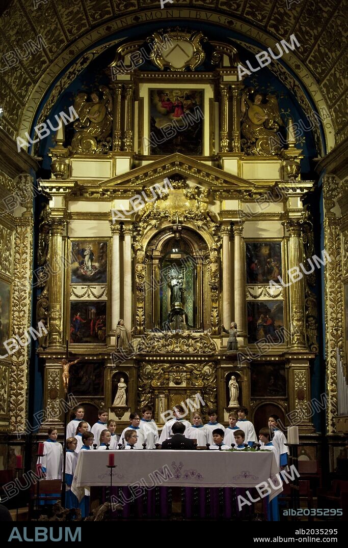 SPAIN Balearic Islands, Mallorca.Santuario de Lluc, Escorca.Actuacion de " Es blauets de Lluc" en la Basilica frente al retablo mayor , obra del Maestro Jaume Blanquer, con la imagen de Santa María, colocada en el centro en un nicho rotatorio.