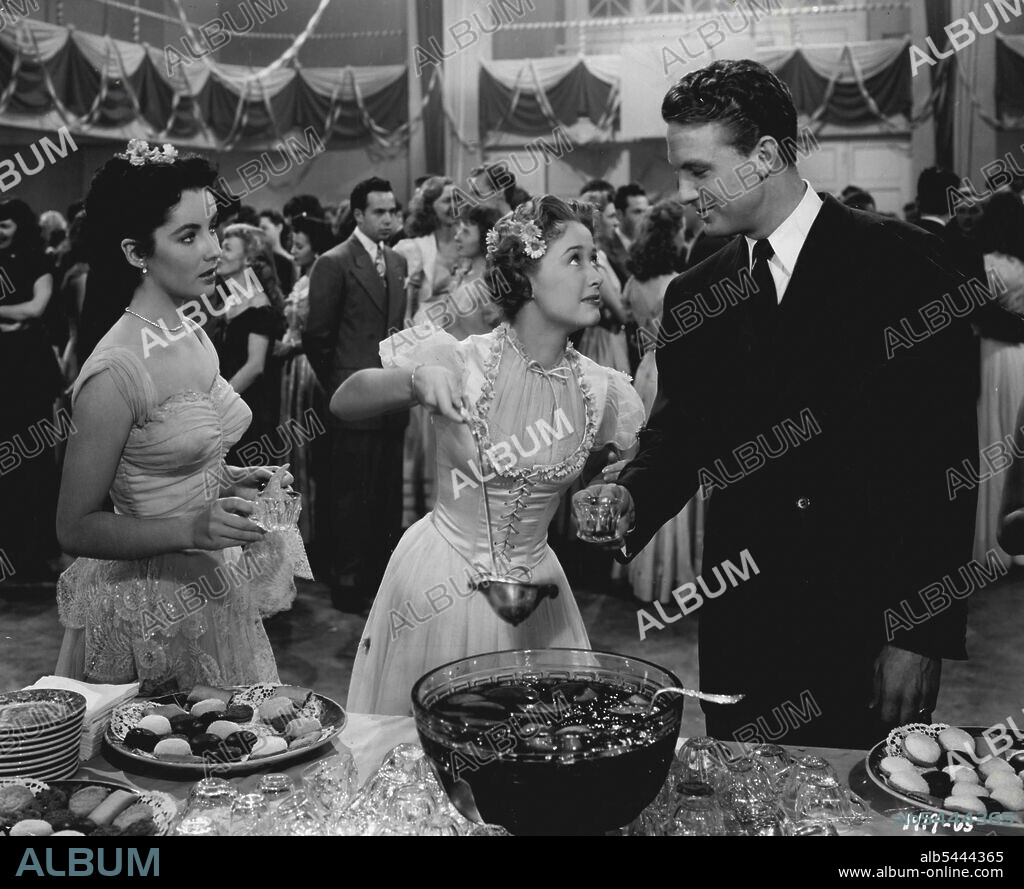 Make A Date With Judy For Fun, Romance And Music.... Metro-Goldwyn-Myer's Technicolor musical comedy starring Wallace Beery, Jane Powell, Elizabeth Taylor, Carmen Miranda, Robert Stack, Soctty Beckett and Xavier Cugat is the story of two girls, their families, their troubles, their fun, and their romances. It was directed by Richard Thorpe, produced by Joe Pasternak, and slanted for the entire family. Elizabeth promises Scotty she'll again "take over" and play Miss Fix-It. Here she interrupts Jane, starry-eyed over her date. October 27, 1948.