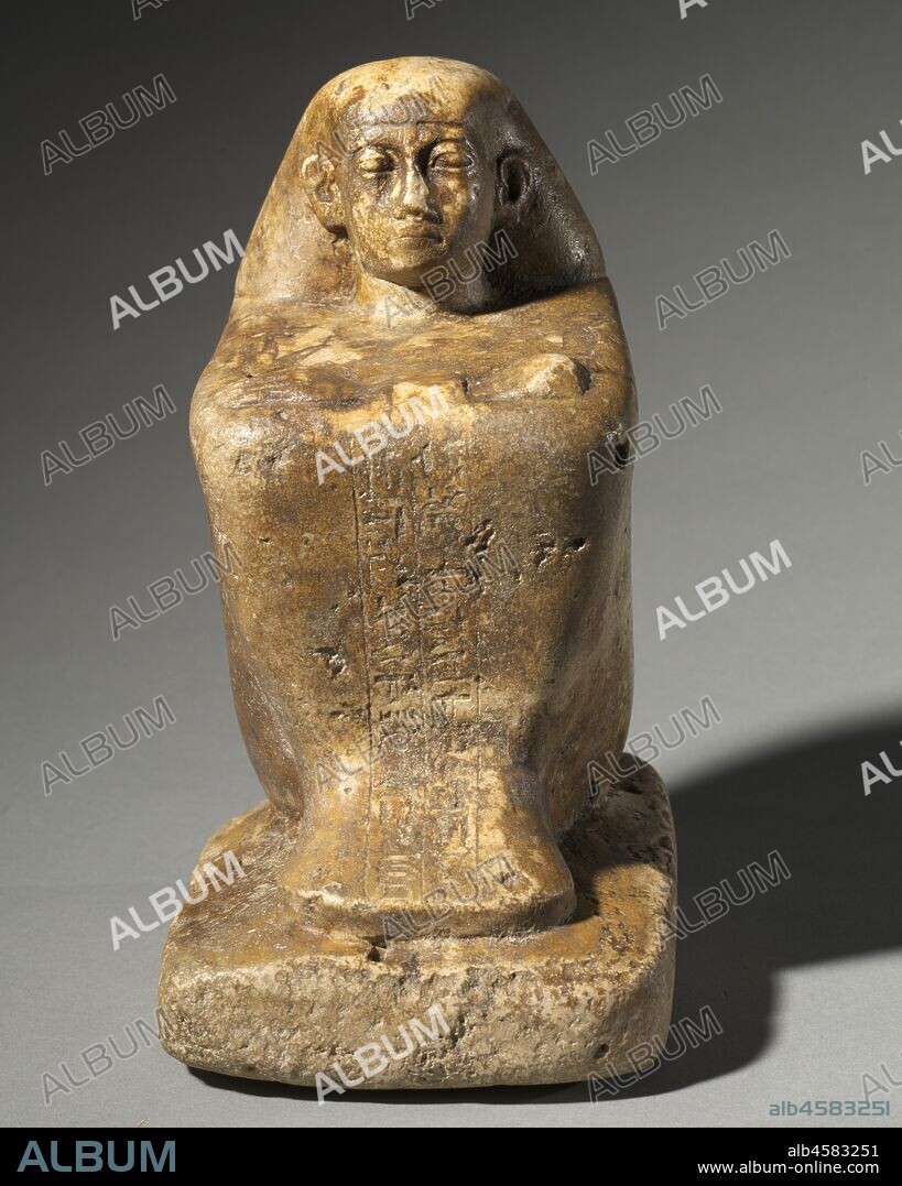 Block Statue of Djedbastetiufankh, c. 664-610 BC. There are two basic types of Egyptian statues: tomb statues and temple statues. The Bust of Ankh-Hor and the Block Statue of Djedbastetiufankh in this case are temple statues. The compact form of the block statue appealed to Egyptian sculptors because it was virtually unbreakable. It represents the subject squatting on the ground, arms crossed over his knees. His long, enveloping mantle is contoured to his body shape, so that it resembles a cube. From the position of the arms, it is evident that the Bust of Ankh-Hor originally belonged to a striding figure holding a naos, or shrine, containing the image of a deity. His high.waisted wraparound robe, fashionable during the Persian Period (Dynasty 27) when this figure was carved, would have reached to his ankles.