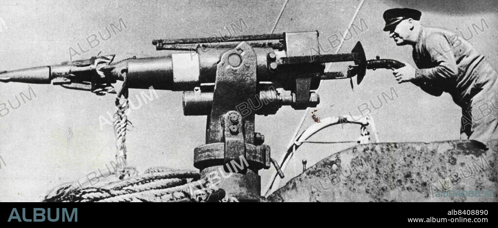 Nowdays the harpoon carries an explosive charge in its head, and is fired by a gun from the bow of a steam "chaser" which is navigated with in range of the whale by the harpooner.Fighting whales with the most modern equipment demands great skill in the operation of the harpoon gun. Here is a gunner taking aim. December 1, 1954.