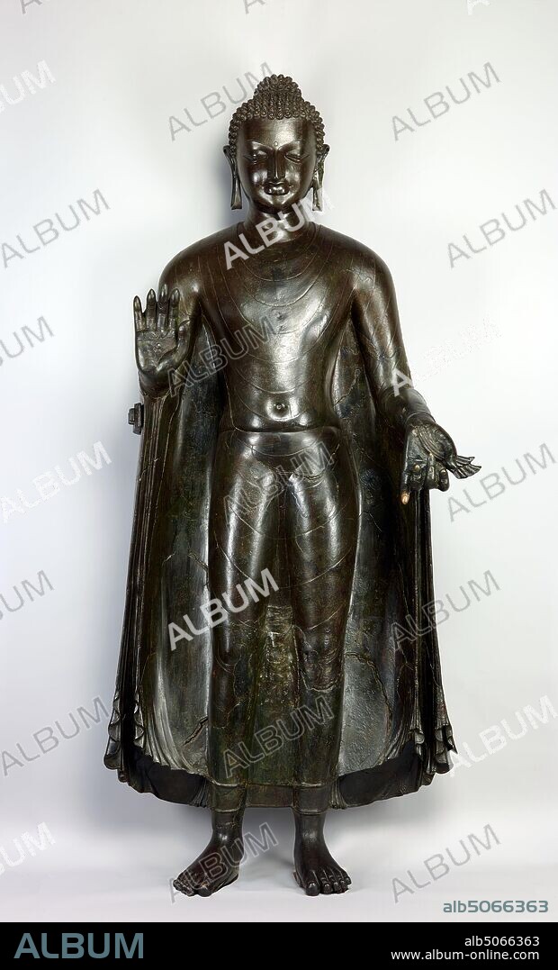 The Sultanganj Buddha, made in India c700. Cast by the lost-wax technique on a clay core, this statue was excavated by E B Harris, a railway engineer, at Sultanganj in northern India during the course of railway construction in 1862. Bronze, Antiquities, Religion, Bhuddism, Sculpture.