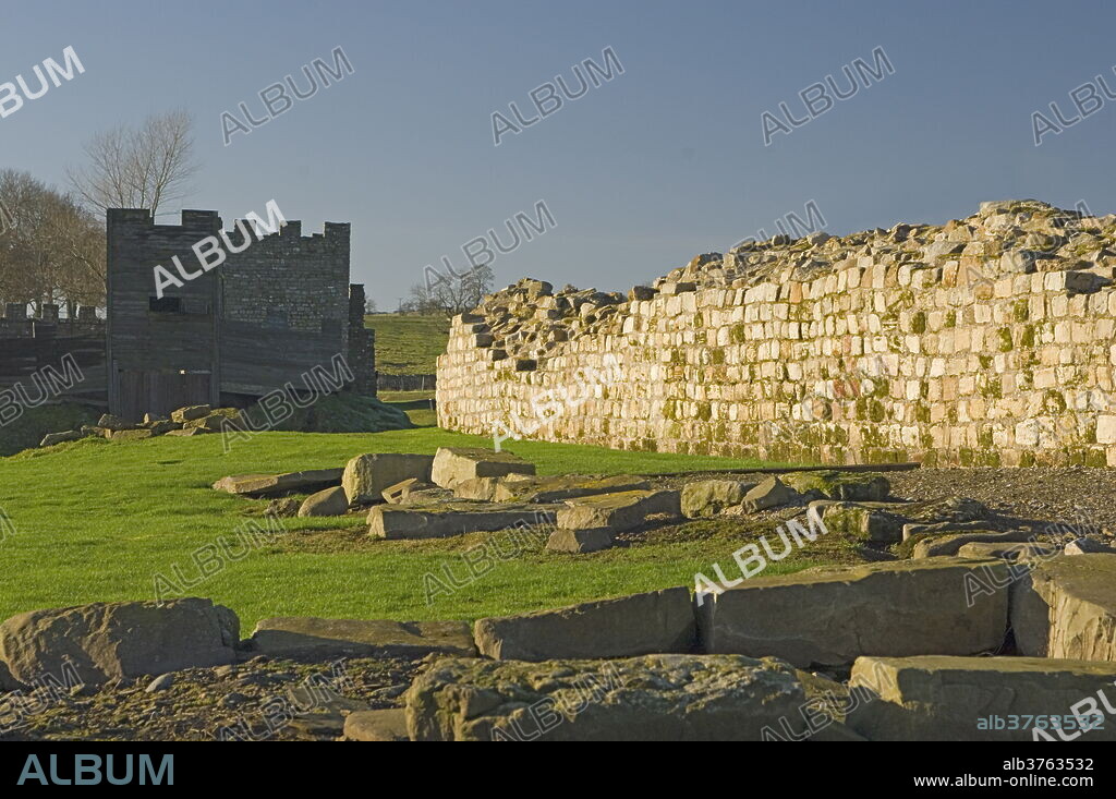 South wall of Roman Fort at Vindolanda, looking west to reconstruction, UNESCO World Heritage Site, Northumbria, England, United Kingdom, Europe.
