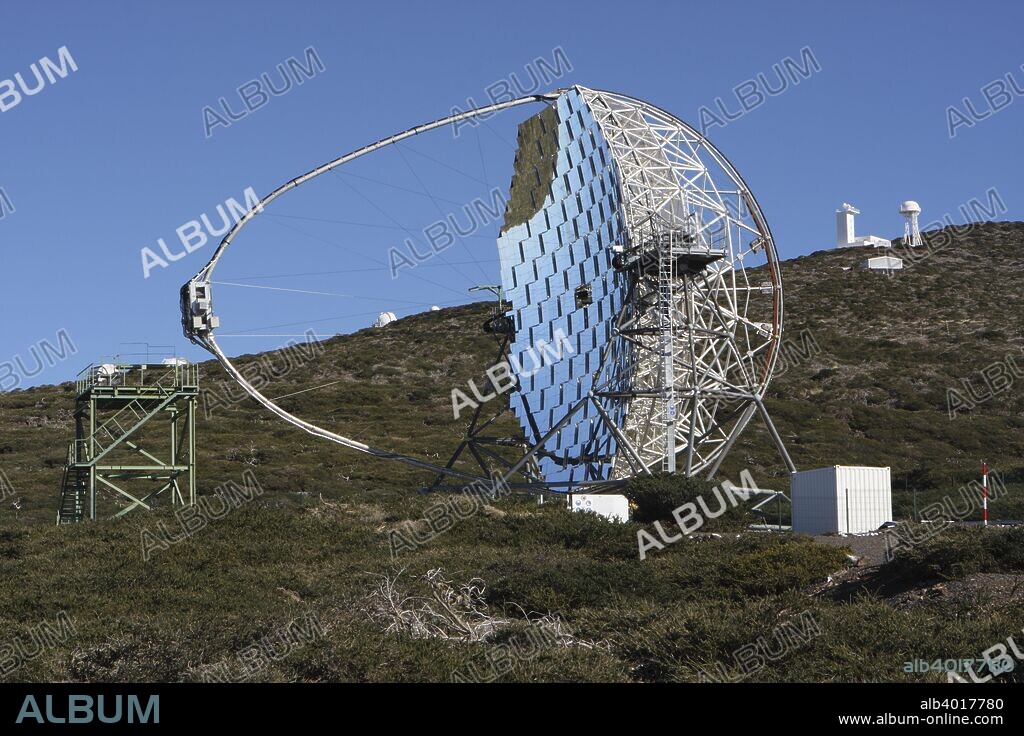 MAGIC telescope, La Palma, Canary Islands, Spain. Several astronomical observatories have been built at Roque de Los Muchachos, the highest point on La Palma at an altitude of just over 2400 metres. The MAGIC (Major Atmospheric Gamma-ray Imaging Cherenkov) telescope detects particle showers released by cosmic gamma-rays using Cherenkov radiation. As of 2009 it was the largest telescope of its type in the world.