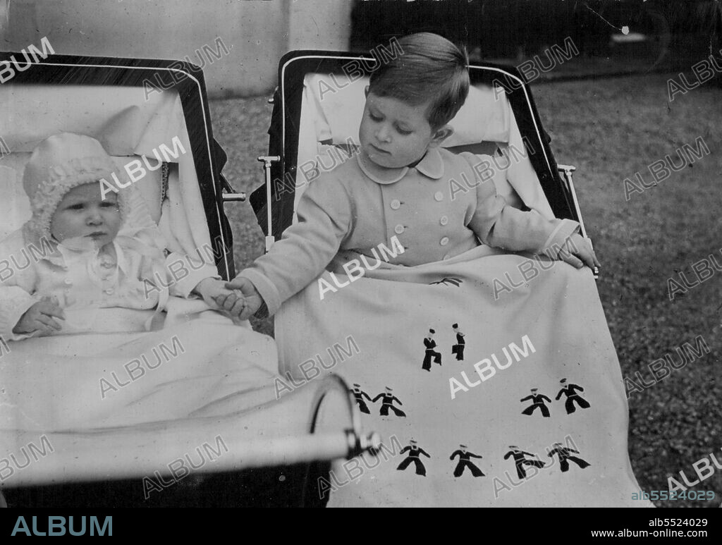 "There's Nothing to be afraid of," says Prince Charles as he affectionately holds Princess Anne's hand during a recent London outing Prince Charles, who adores Princess Anne, calls her "Baby Sister." August 23, 1951. (Photo by Kosmos Bureau Pty. Ltd.).