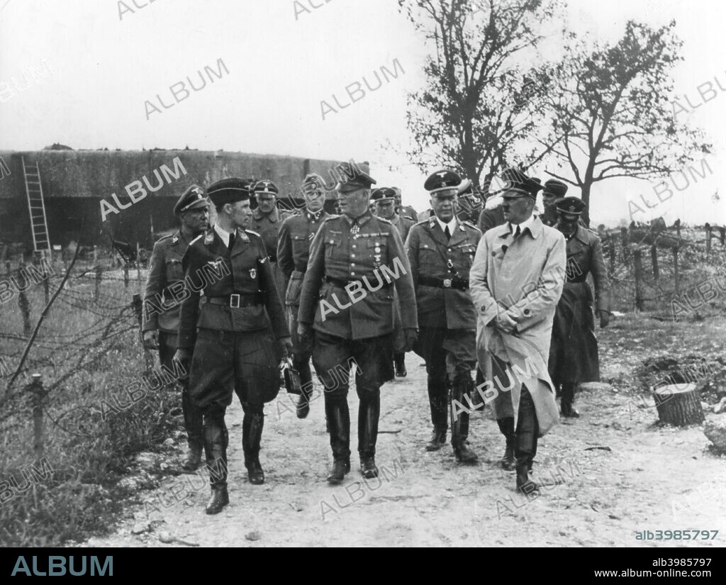 Adolf Hitler and General Wilhelm Keitel inspecting the Maginot Line, France, 1940. France built the system of fortifications known as the Maginot Line in the 1930s to protect its eastern frontier from invasion. In the event of the actual invasion in 1940, the Germans simply bypassed the supposedly impregnable line. Instead they entered France through the Ardennes, a strategy disregarded by the French due to their belief that the terrain would be impassable for tanks.