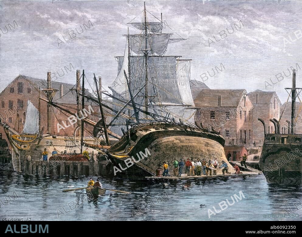 Old Whaling ship hove down for repairs, New Bedford, Massachusetts, 1800s. Handcolored woodcut of a 19thcentury illustration.