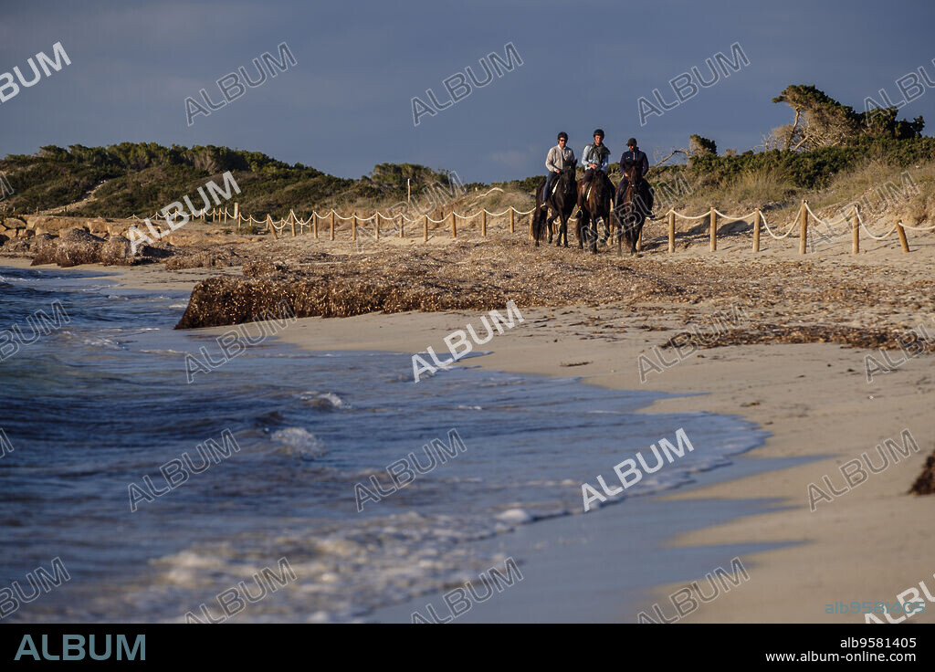 riding a horse, Es Cavall d'En Borràs, Formentera, Pitiusas Islands, Balearic Community, Spain.