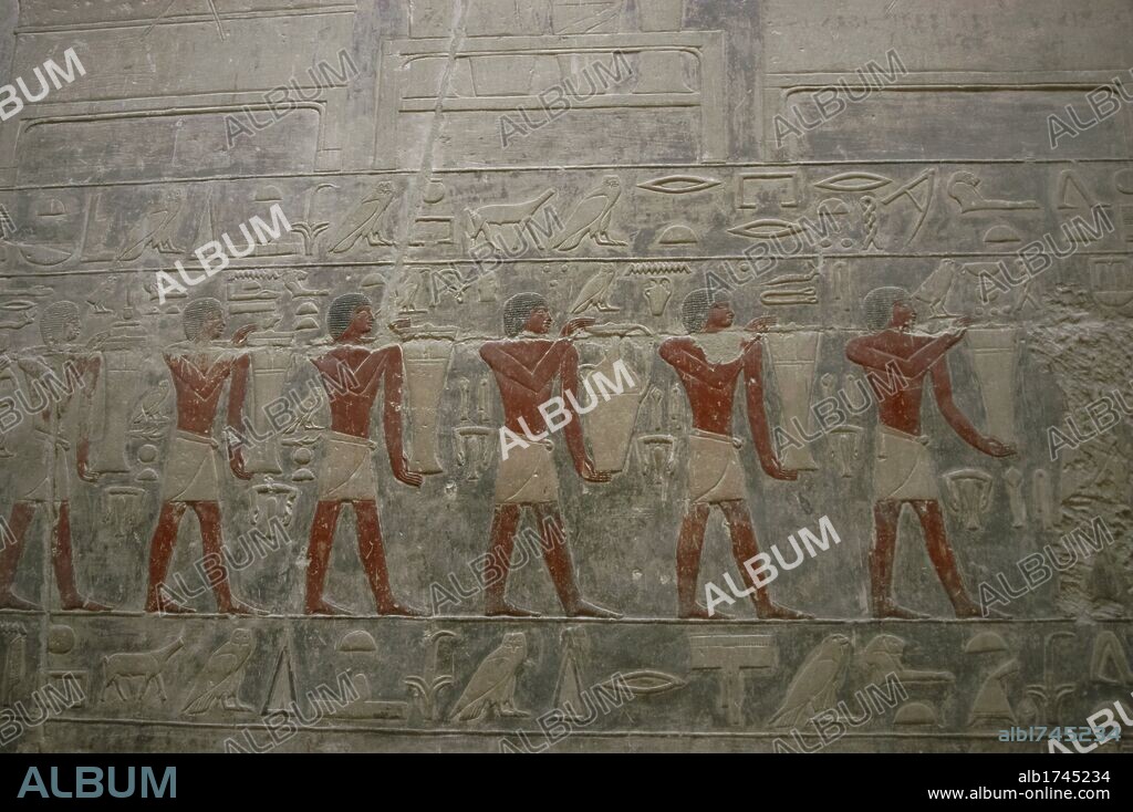 Mastaba of Kagemni (2350 BC). Chief Justice and vizier of the Pharaoh Teti. Hall of the False Door Stela. Relief depicting servants carrying offerings to the Ka of the deceased. Old Kingdom. Saqqara. Egypt.