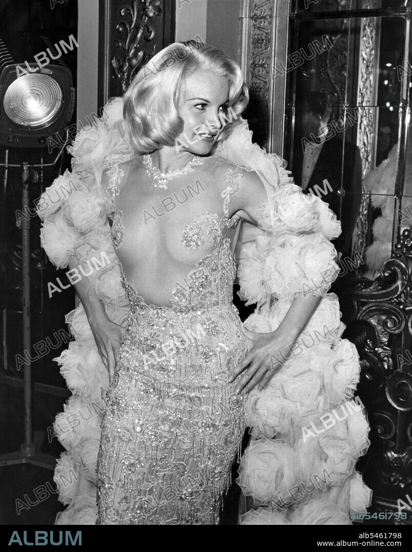 CARROLL BAKER in THE CARPETBAGGERS, 1964, directed by EDWARD DMYTRYK. Copyright PARAMOUNT/EMBASSY.