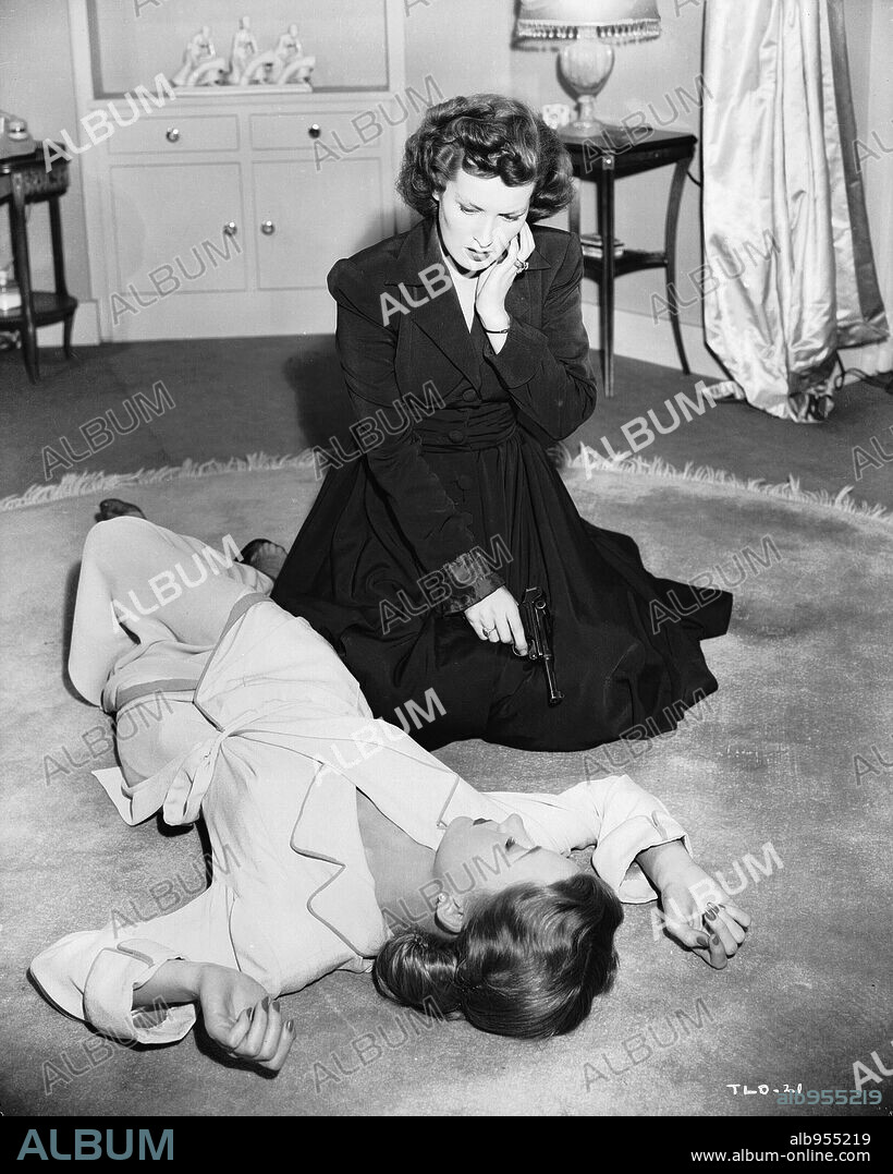 GLORIA GRAHAME and MAUREEN O'HARA in A WOMAN'S SECRET, 1949, directed by NICHOLAS RAY. Copyright RKO RADIO.