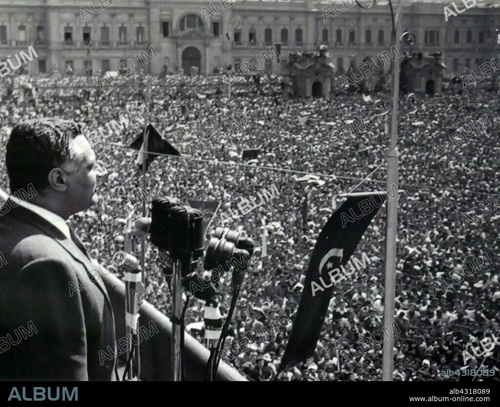 Crowds welcome Gamal Abdel Nasser (1918 - 1970), President of Egypt, serving from 1956 until his death in 1970. Nasser led the 1952 overthrow of the monarchy and introduced far-reaching land reforms the following year.