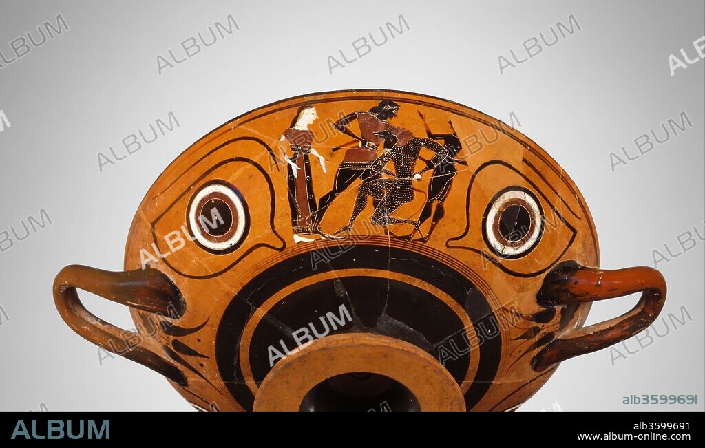 Terracotta kylix: eye-cup (drinking cup). Culture: Greek, Attic. Dimensions: H. 5 in. (12.7 cm)
diameter  11 7/8 in. (30.2 cm). Date: ca. 530 B.C..
Obverse and reverse, between eyes, Theseus and the Minotaur
In Greek mythology, Athens was once subject to King Minos of Crete and was obliged to send a yearly tribute of seven youths and seven maidens. They either lost their way in the king's labyrinthine palace or were consumed by the Minotaur, part man and part bull. Theseus, with the help of Ariadne, Minos' daughter, killed the monstrous creature. The episode appears here with youths and maidens as spectators.