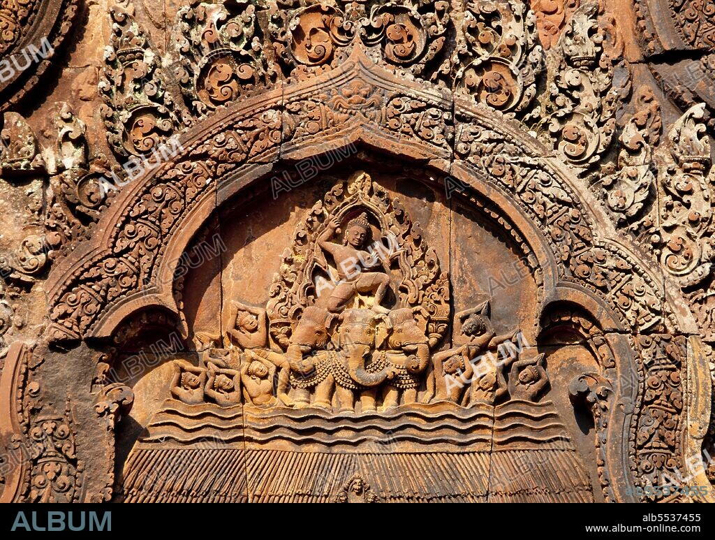 Banteay Srei (or Banteay Srey) is a 10th century Cambodian temple dedicated to the Hindu god Shiva and is located to the north-east of the main group of temples at Angkor. Banteay Srei is built largely of red sandstone, a medium that lends itself to the elaborate decorative wall carvings which are still observable today. Banteay Srei is sometimes referred to as the 'jewel of Khmer art.'.