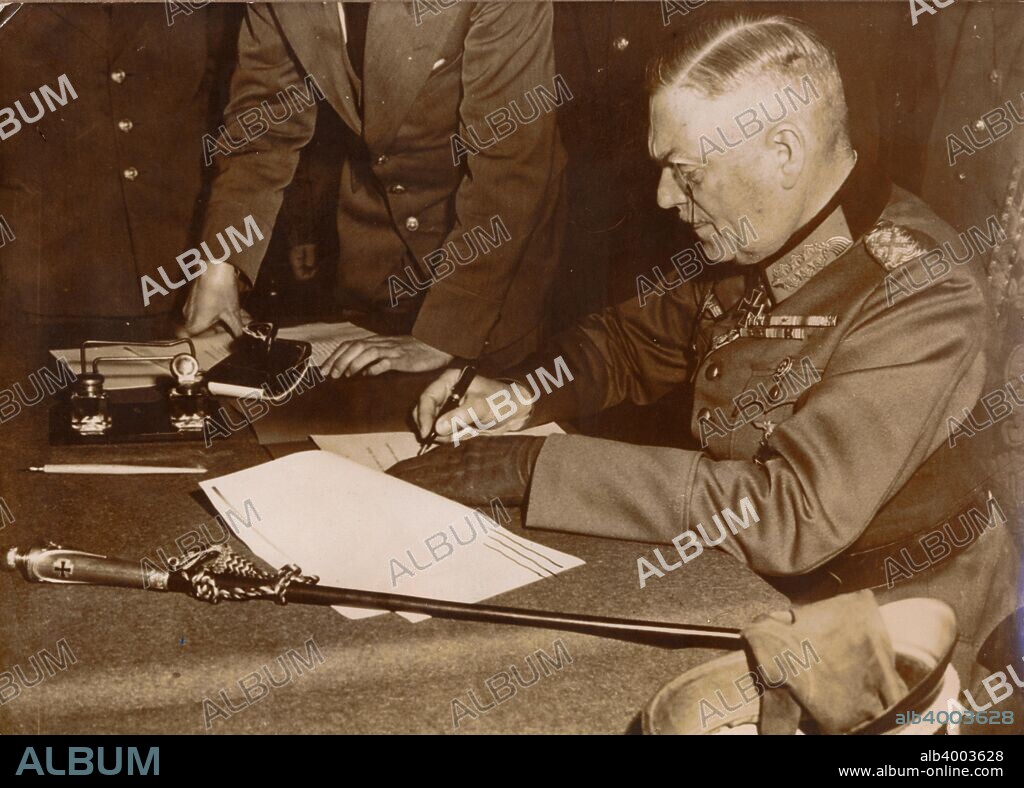 Unconditional surrender of Nazi Germany, Berlin, World War II, 8 May 1945. Field Marshal Wilhelm Keitel (1882-1946), Chief of Staff of the German Armed Forces signing on behalf of the army. A surrender had been signed the previous day in Rheims, but the Soviet representative at the signing, Major-General Ivan Susloparov, did not have official authorisation from Moscow to sign the document and the Soviets insisted on a second signing, which took place in Berlin shortly before midnight on 8 May.