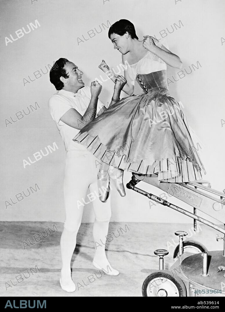 LESLIE CARON and MICHAEL WILDING in THE GLASS SLIPPER, 1955, directed by CHARLES WALTERS. Copyright M.G.M.