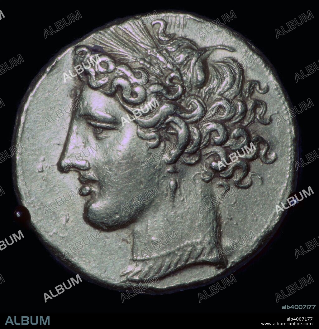 Obverse side of a gold tetradrachm with the head of Tanit (identified with Persephone) facing left, 3rd century BC. Minted during the first Punic War.