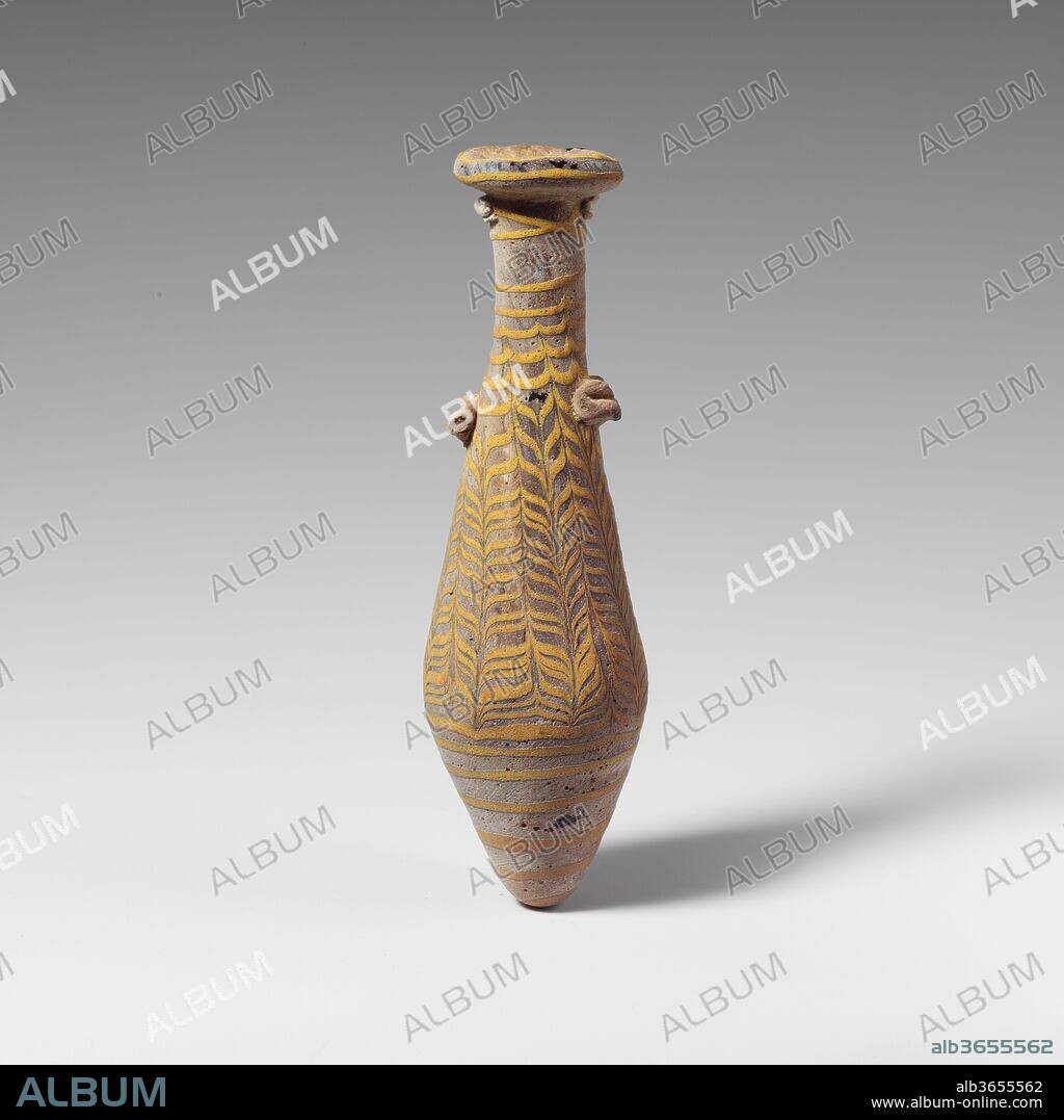 Glass alabastron (perfume bottle). Culture: Greek, Eastern Mediterranean. Dimensions: H.: 5 3/16 in. (13.2 cm)
Diam.: 1 9/16 x 1 1/8 in. (4 x 2.9 cm). Date: 2nd-mid-1st century B.C..