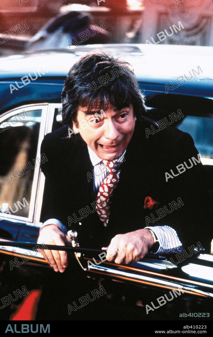 DUDLEY MOORE in ARTHUR 2: ON THE ROCKS, 1988. Copyright WARNER BROTHERS.