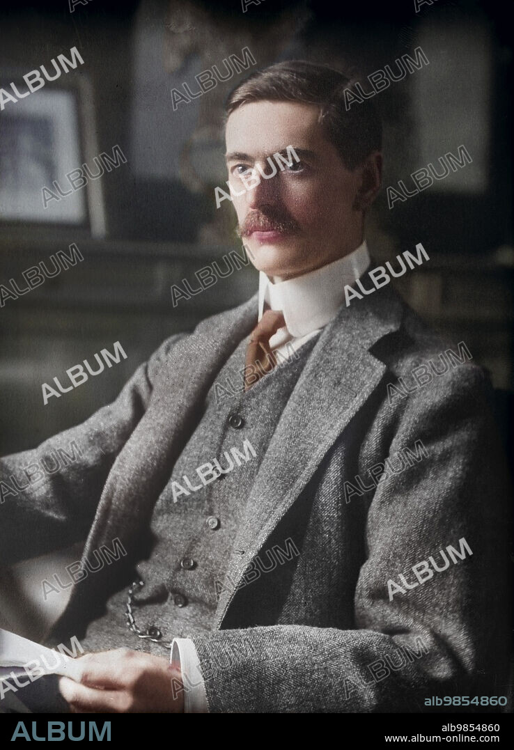 Neville Chamberlain (1869-1940), British politician, served as Prime Minister 1937-1940, half-length seated portrait, Bain News Service, colorized, between 1915 and 1920.