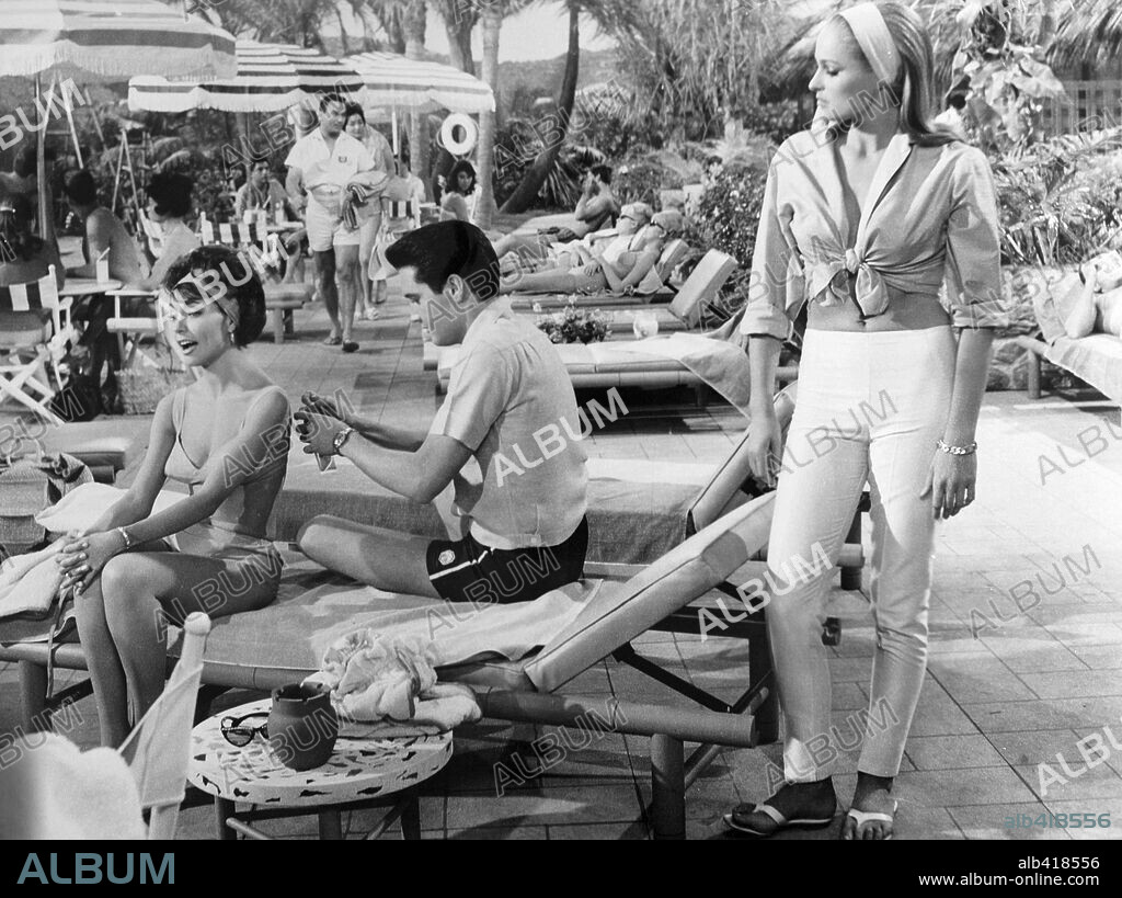 ELSA CARDENAS, ELVIS PRESLEY and URSULA ANDRESS in FUN IN ACAPULCO, 1963, directed by RICHARD THORPE. Copyright PARAMOUNT PICTURES.