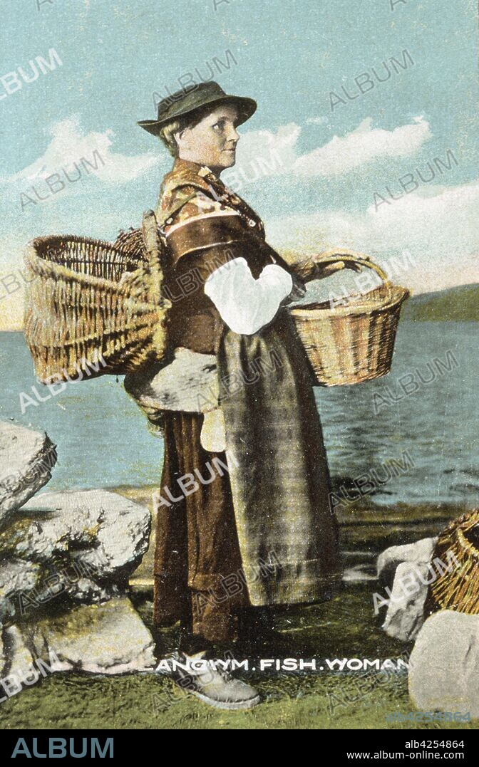 A fish woman from Llangwm, Pembrokeshire, c1900-1910. Print depicting Welsh peasant costume. Copied from postcard..