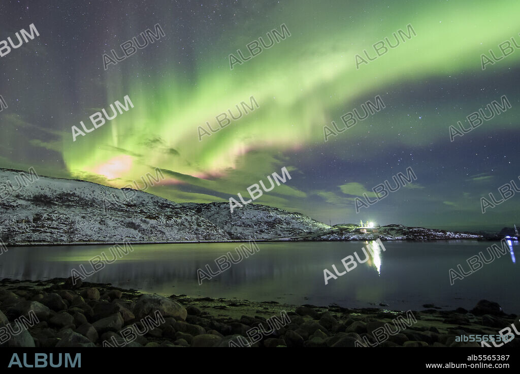 January 7, 2019 - Aurora borealis dances above the Arctic Ocean from Teriberka, Murmansk, Russia.