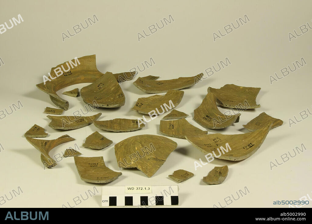 24 edge and wall shards of a cooking pot, of which 6 consist of shards glued together. Decorations on the neck, pot, shards, earthenware (Badorf), 16.1 x 10.6 cm (largest shard), vmec 750-850, Netherlands, Utrecht, Wijk bij Duurstede, Wijk bij Duurstede, Dorestad.