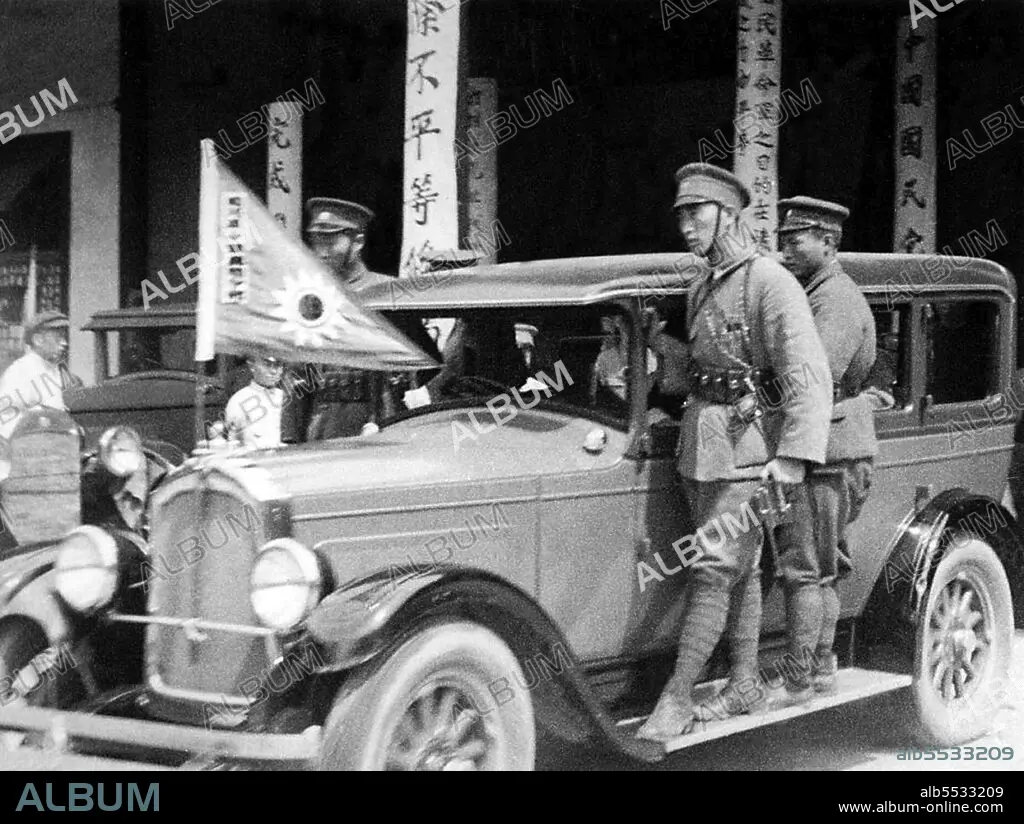 China: General Chiang Kai-shek in his car guarded by KMT ...