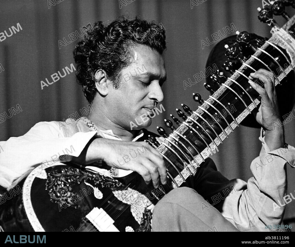 Ravi Shankar playing a classical Indian raga on sitar. Ravi Shankar (born April 7th, 1920) is an Indian musician and composer who plays the plucked string instrument sitar. He has been described as the most known contemporary Indian musician. Shankar is considered one of the top sitar players of the second half of the 20th century. He became known for a distinctive playing style in the middle and high registers that uses quick and short deviations of the playing string and his sound creation through stops and strikes on the main playing string. Undated photograph.